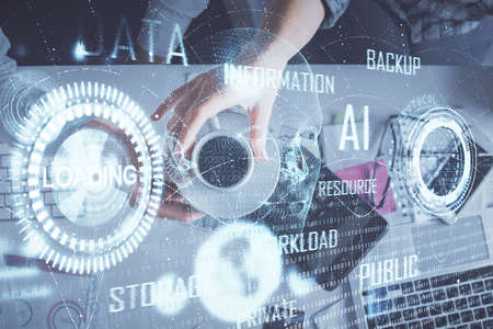 Double exposure of man and woman working together and data theme hologram drawing. Computer...