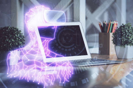 Computer on desktop with AR theme icon. Multi exposure. Concept of augmented reality.