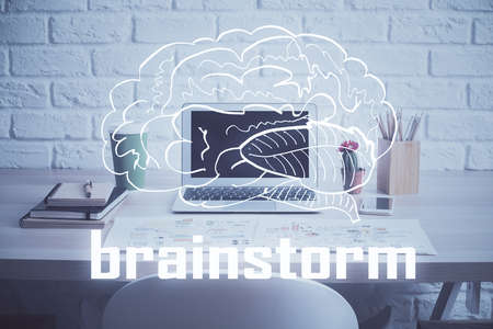 Desktop computer background in office and start up theme hologram drawing. Double exposure. Startup...