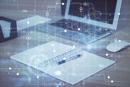 Double exposure of computer and technology theme hologram. Concept of freelance work.