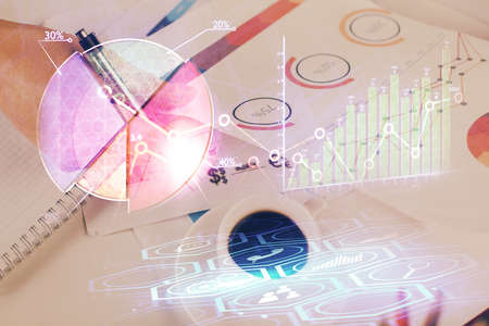 Multi exposure of man planing investment with stock market forex chart background. Concept of research and trading.の写真素材