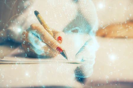 Double exposure of womans writing hand on background with brain hologram. Concept of brainstorming.の写真素材