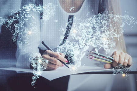 Social network theme hologram over hands taking notes background. Concept of global international...