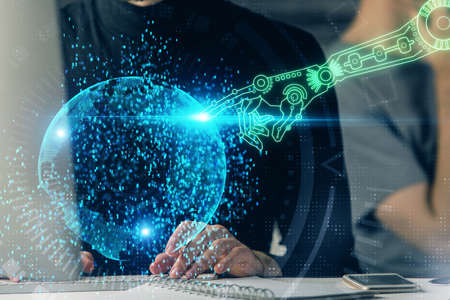Multi exposure of data internet theme hologram with man working on computer on background. Concept...