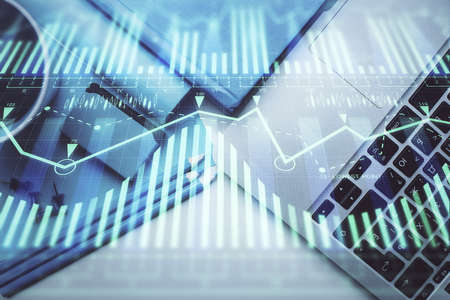 Multi exposure of data drawing hologram over topview of study desk background with computer. Concept...