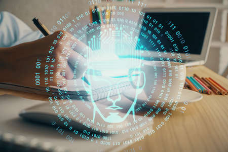 Multi exposure of writing hand on background with brain hologram. Concept of self learning.の写真素材