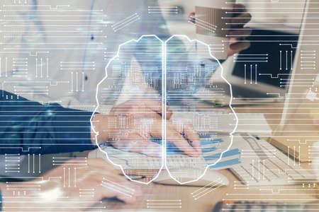 Man with computer background with brain theme hologram. Concept of brainstorm. Double exposure.の写真素材