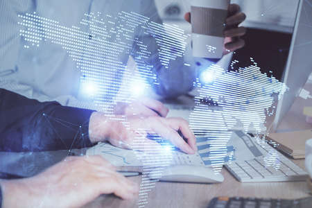 Social network theme hologram with businessman working on computer on background. Multi exposure.の写真素材