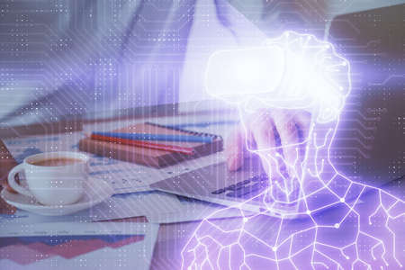 AR hologram with man working on computer on background. Augmented reality concept. Double exposure.