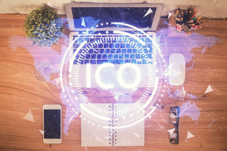 Blockchain theme hologram drawings over computer on the desktop background. Top view. Double exposure.の写真素材