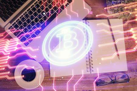 Blockchain theme hologram drawings over computer on the desktop background. Top view. Double exposure.の写真素材