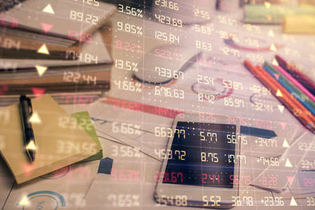 Double exposure of forex chart drawing and cell phone background. Concept of financial data analysis