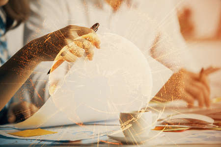 Double exposure of social network theme drawing over people taking notes background. Concept of...