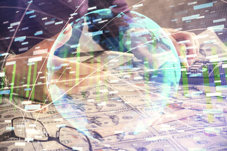 Double exposure of mans hands holding and using a phone and international business theme drawing.の写真素材