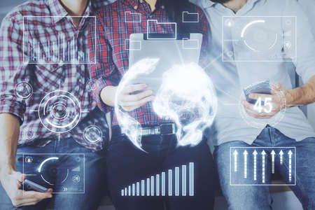 Double exposure of forex graph drawing and man and woman working together holding and using a mobile...
