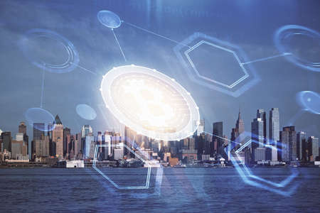 Double exposure of crypto currency theme hologram drawing and city veiw background. Concept of...