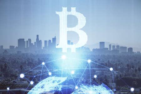 Double exposure of crypto currency theme hologram drawing and city veiw background. Concept of...