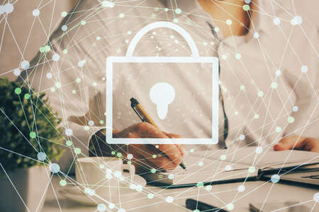 Humans hands with cyber security theme multi exposure background drawings. Concept of online protection.の写真素材