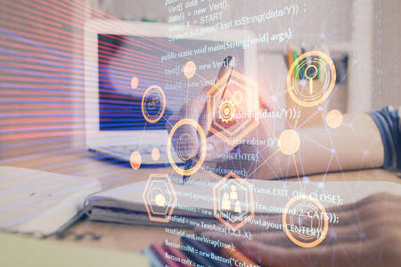 Double exposure of womans hands on background with technology and digital coding icons. Data...
