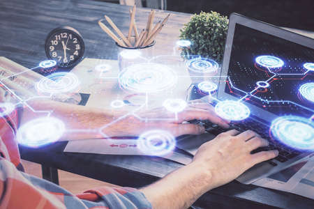 Media network theme hologram with man working on computer on background. Concept of internet communication. Double exposure.の写真素材
