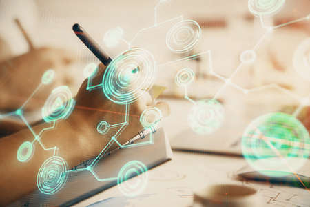 Double exposure of social network theme drawing over people taking notes background. Concept of...