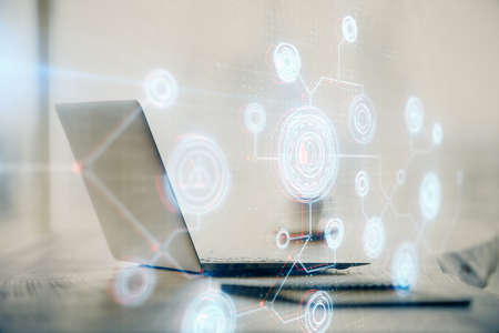 Double exposure of table with computer on background and data theme drawing. Concept of innovation.