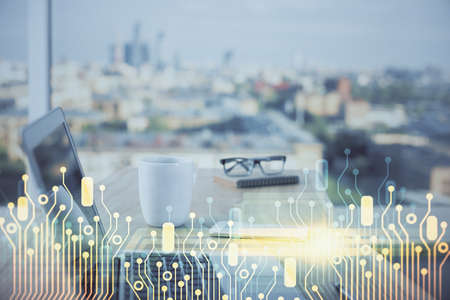 Double exposure of desktop computer and technology theme hologram. Concept of software development.
