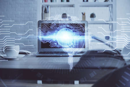Double exposure of table with computer and brain hologram. Data innovation concept.の写真素材