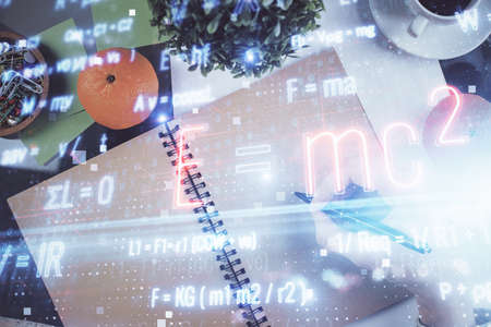 Science formula hologram over womans hands taking notes background. Concept of study. Double...
