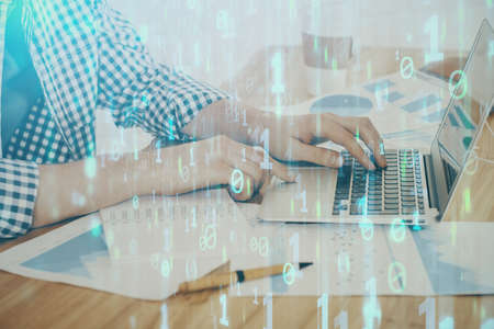 Businessman working on Laptop with technology theme drawing. Concept of big data. Double exposure.
