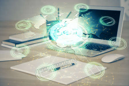 Computer on desktop with social network theme icon. Multi exposure. Concept of international...