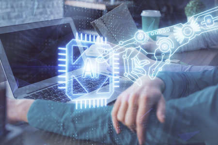 Double exposure of man and woman working together and technology theme drawing hologram. Big data concept. Computer background.の写真素材