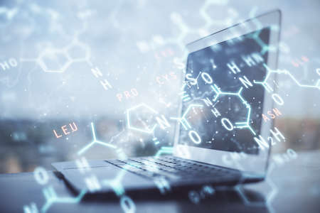 Desktop computer background and formula hologram writing. Double exposure. Education concept.の写真素材