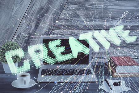 Desktop computer background in office and start up theme hologram drawing. Double exposure. Startup...