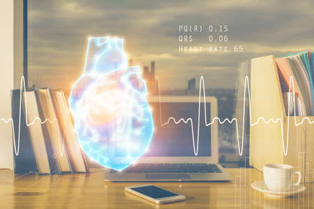 Desktop computer background and heart drawing. Double exposure. Medical study and healthcare...