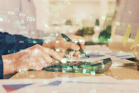 Writing mans hands background with data drawings. Double exposure. Network and data concept.の写真素材