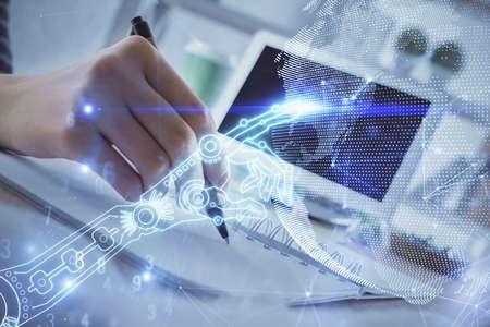 Tech theme hologram over womans hands taking notes background. Concept of hightech. Double exposure