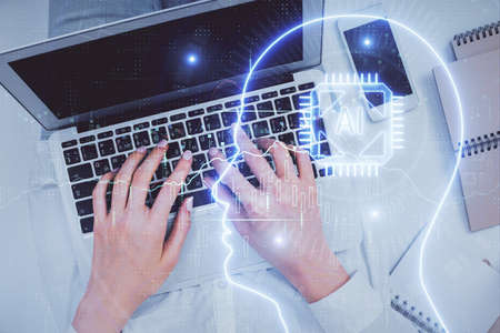 Double exposure of woman working on computer andhuman brain hologram drawing. Top View. Ai concept.
