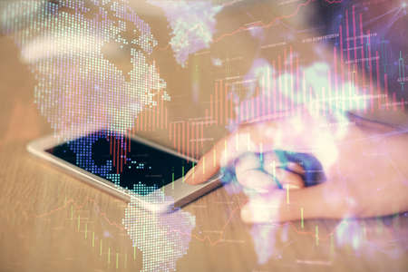 Double exposure of forex chart sketch hologram and woman holding and using a mobile device....
