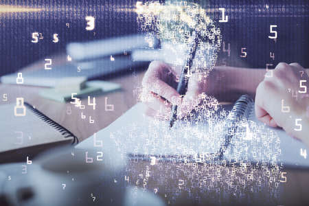 Tech theme hologram over womans hands taking notes background. Concept of hightech. Double exposureの写真素材