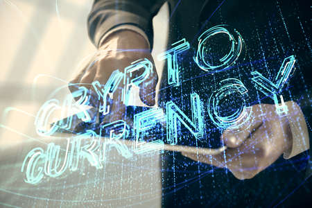 Double exposure of mans hands holding and using a phone and crypto currency blockchain theme drawing.の写真素材