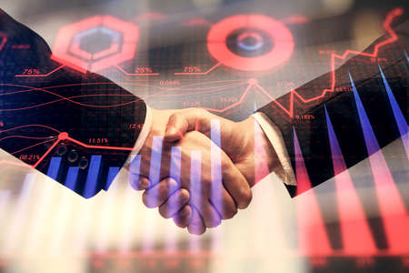 Double exposure of forex graph hologram and handshake of two men. Stock market concept.