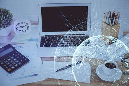 Computer on desktop with social network hologram. Double exposure. Concept of international people...