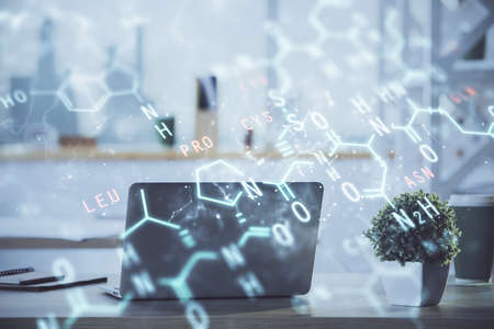 Desktop computer background and formula hologram writing. Double exposure. Education concept.の写真素材