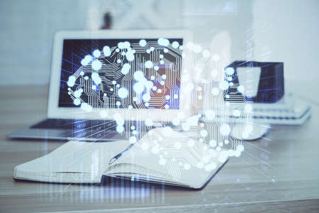 Multi exposure of work space with computer and human brain hologram. Brainstorm concept.