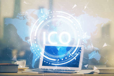 Multi exposure of blockchain theme hologram and table with computer background. Concept of bitcoin...