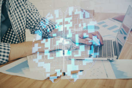 Businessman working on Laptop with technology theme drawing. Concept of big data. Double exposure.