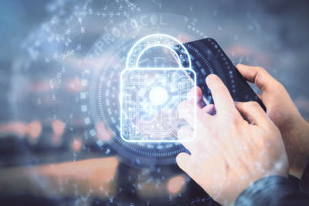 Multi exposure of mans hands holding and using a digital device and lock drawing. Security concept.