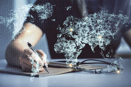 Social network theme hologram over hands taking notes background. Concept of global international...