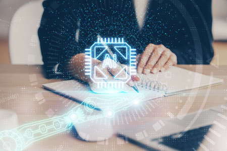 Double exposure of writing hands on background with data solution hologram on front. Technology...